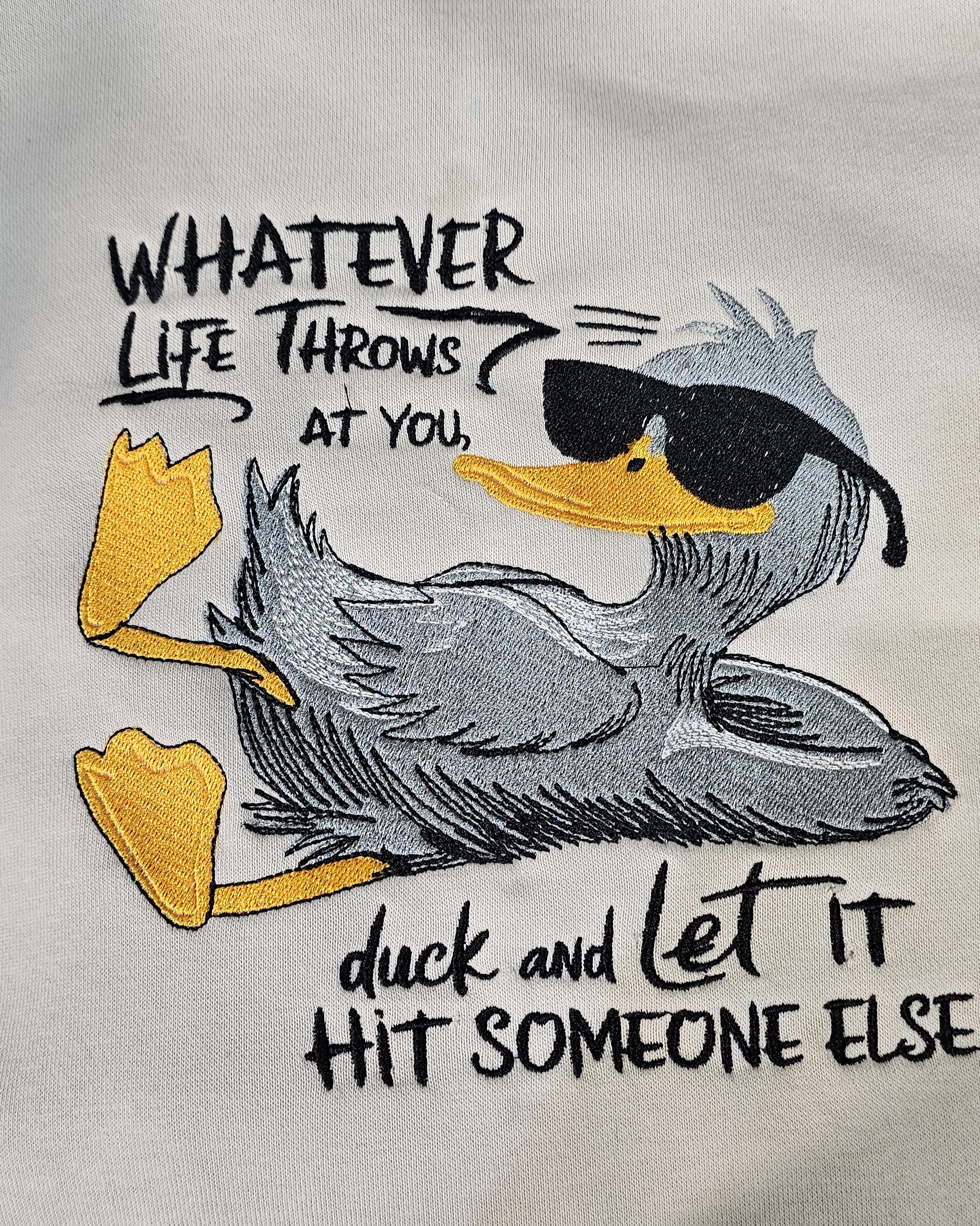 Large custom duck design embroidered on apparel