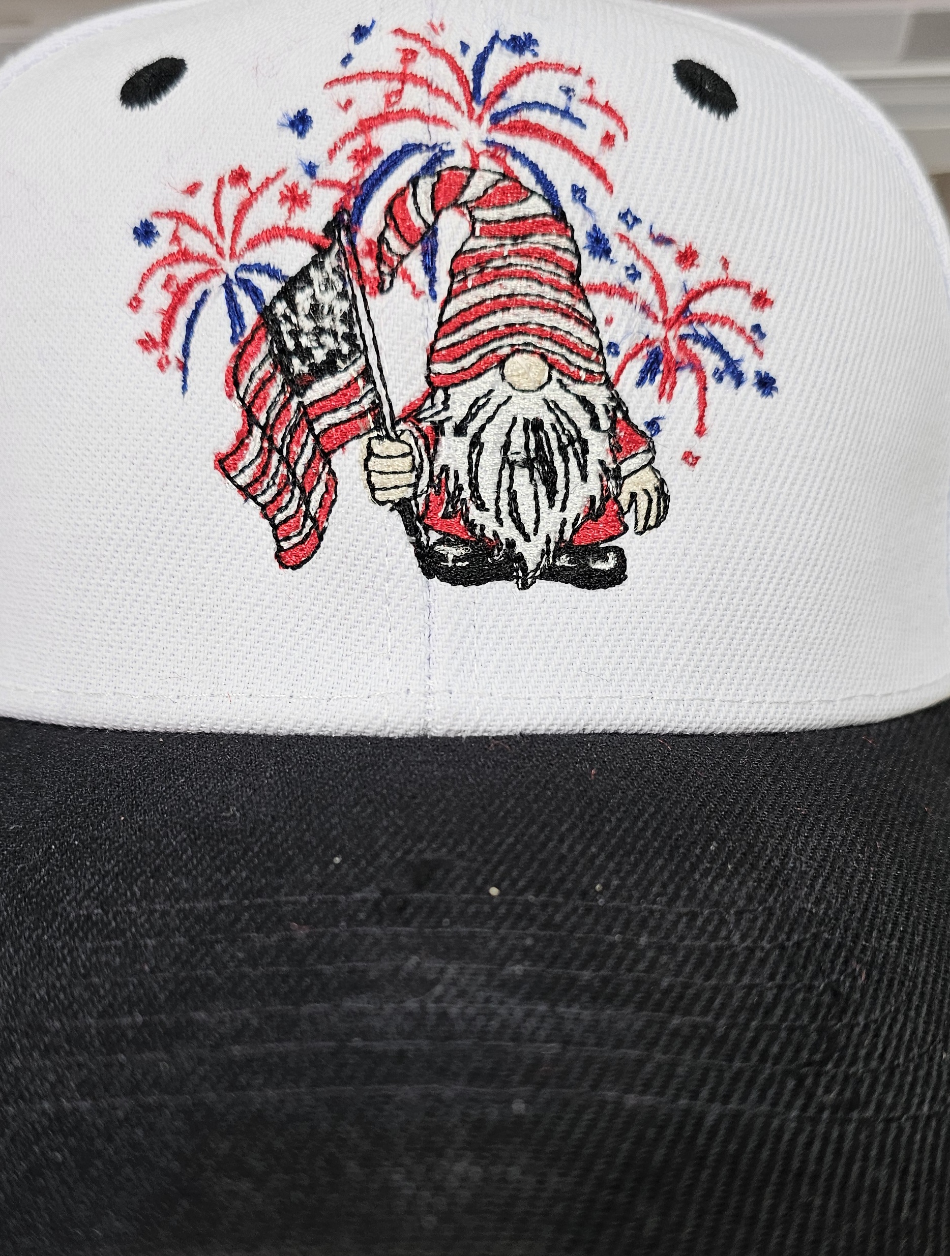 White and black hat with patriotic gnome embroidery