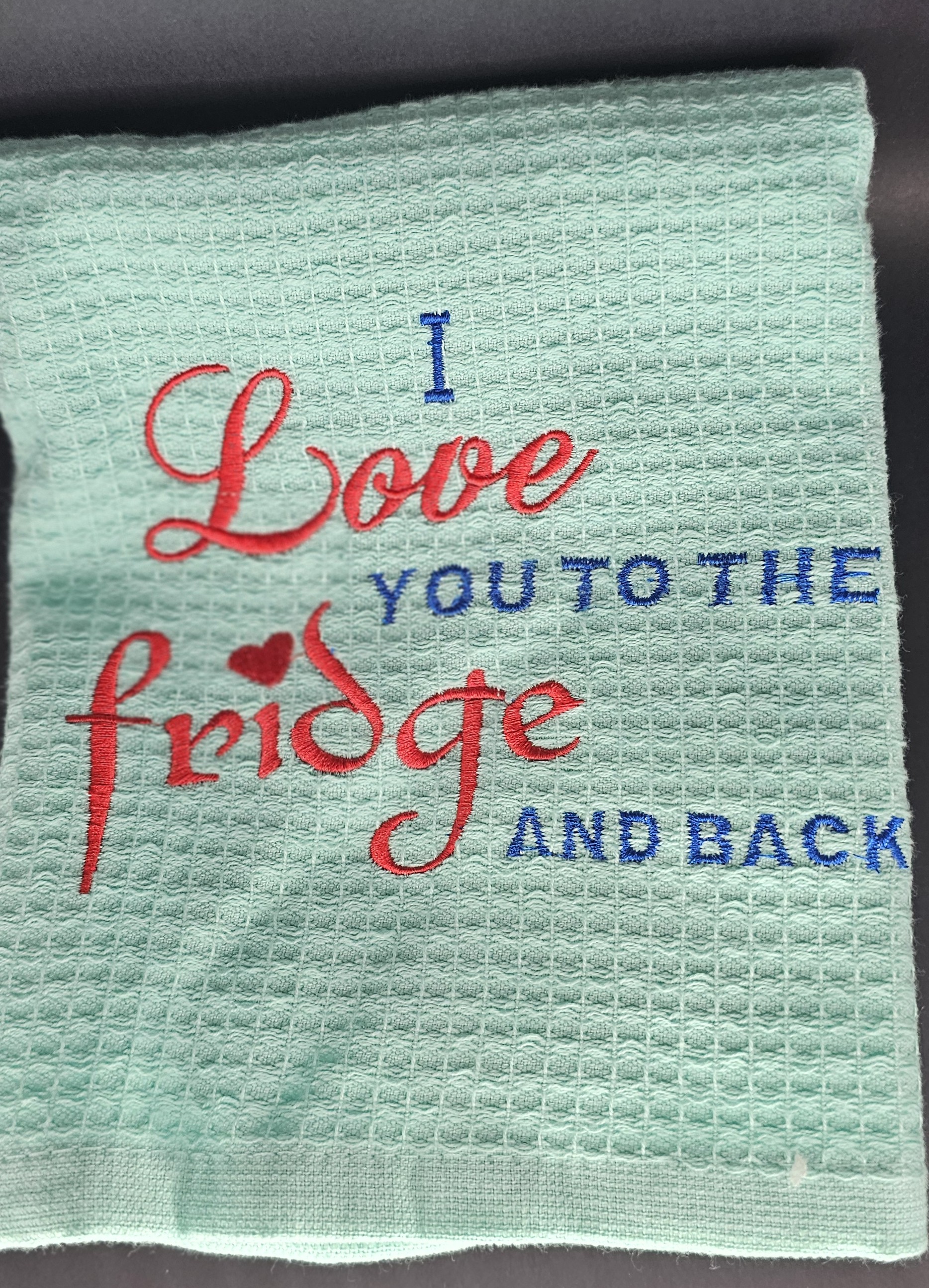 Green towel with bride embroidery